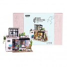 Kevin`s studio - Miniatyr hus - Byggesett i tre med lys thumbnail